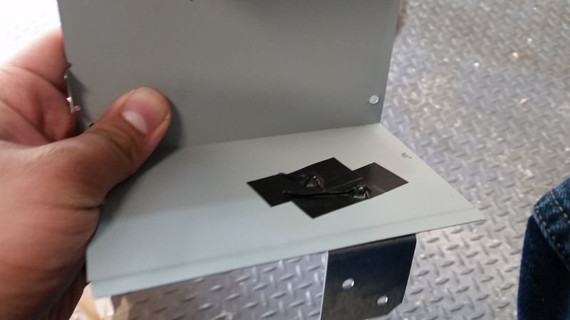 To keep the screws from shorting the PSU, I covered the heads with electrical tape